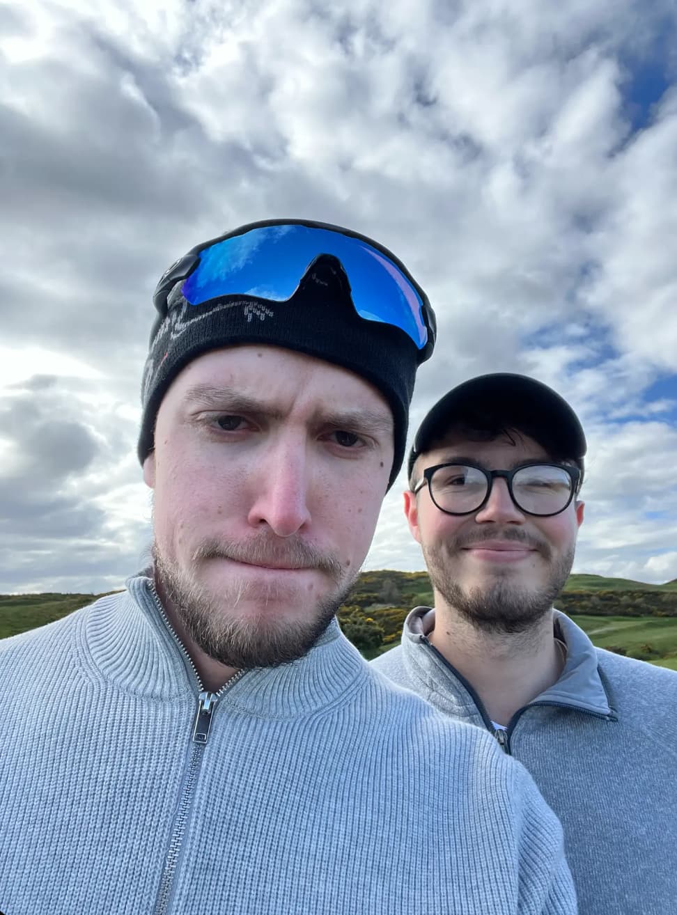 Tom and Jack on a windy links course in the UK
